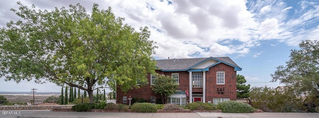 view of front of property with brick siding