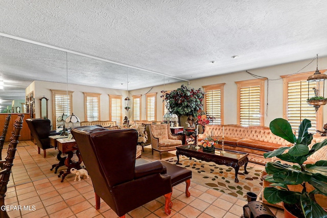 living room with light tile patterned floors and a textured ceiling