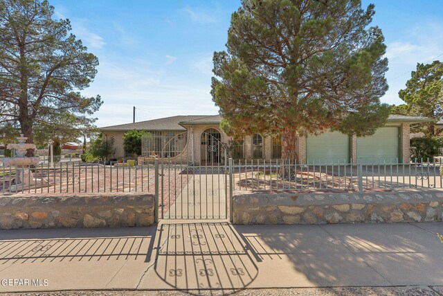 view of front of property with a garage