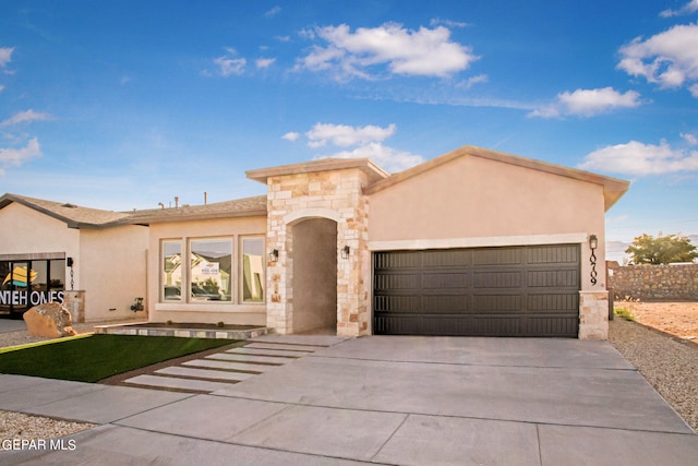 view of front of home with a garage