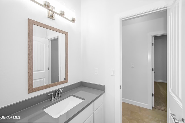 bathroom with vanity and tile patterned floors