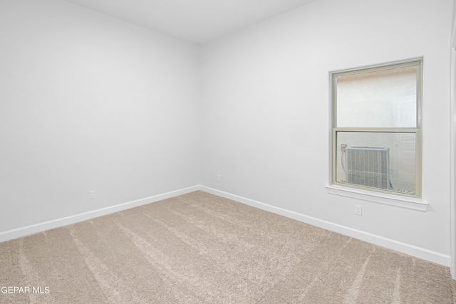 unfurnished room featuring carpet floors