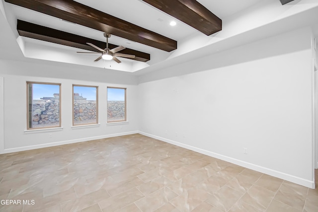 unfurnished room featuring beam ceiling and ceiling fan