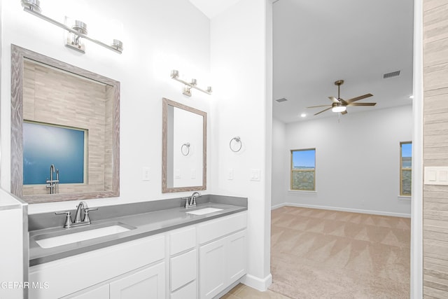 bathroom featuring vanity and ceiling fan