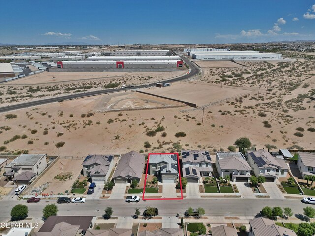 birds eye view of property with a residential view