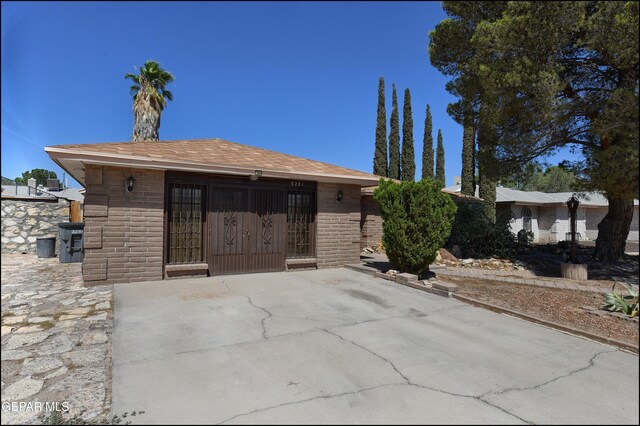 single story home featuring a patio area