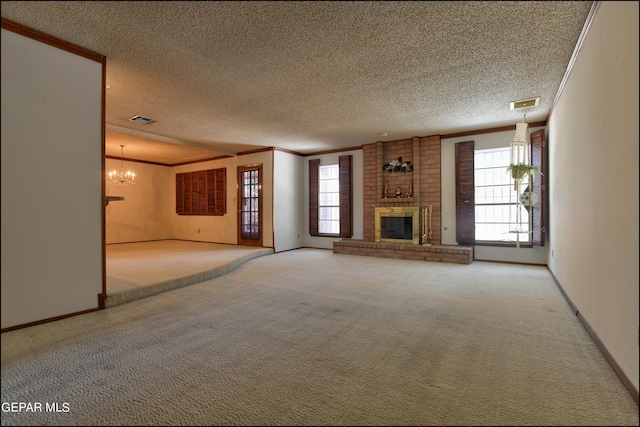 unfurnished living room featuring a fireplace, visible vents, and crown molding