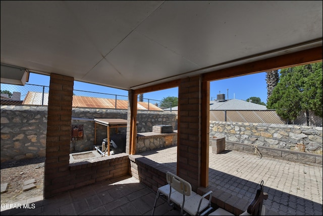 view of patio / terrace featuring fence and area for grilling