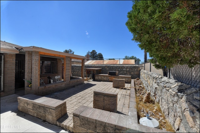 view of patio / terrace with fence