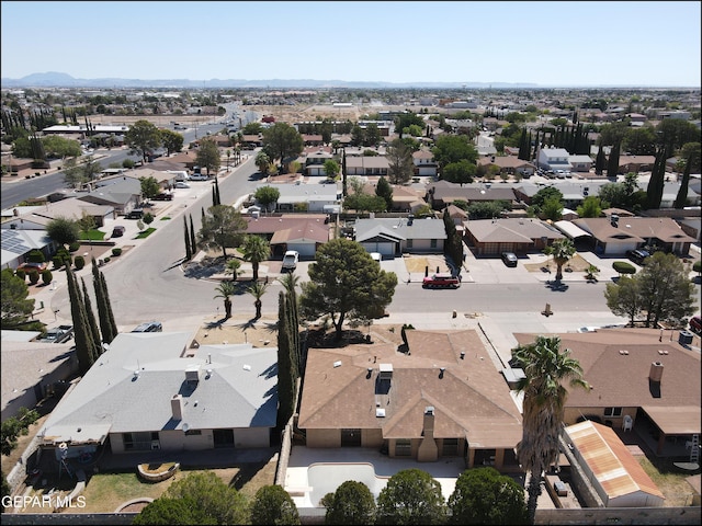 birds eye view of property with a residential view