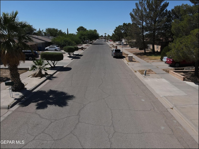 view of street featuring sidewalks and curbs