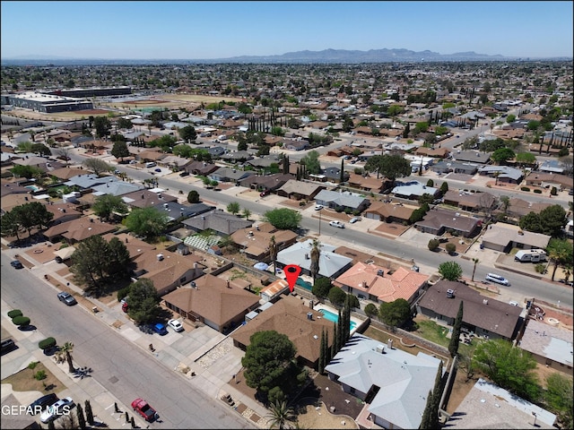drone / aerial view with a mountain view and a residential view