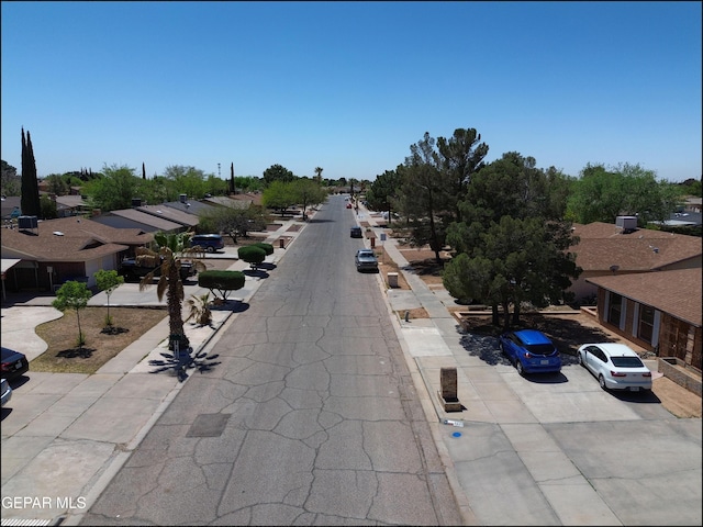 view of road featuring curbs and sidewalks
