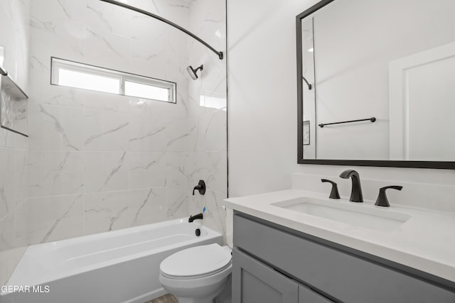 full bath featuring toilet, shower / washtub combination, and vanity