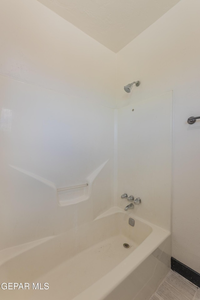 full bath with tub / shower combination