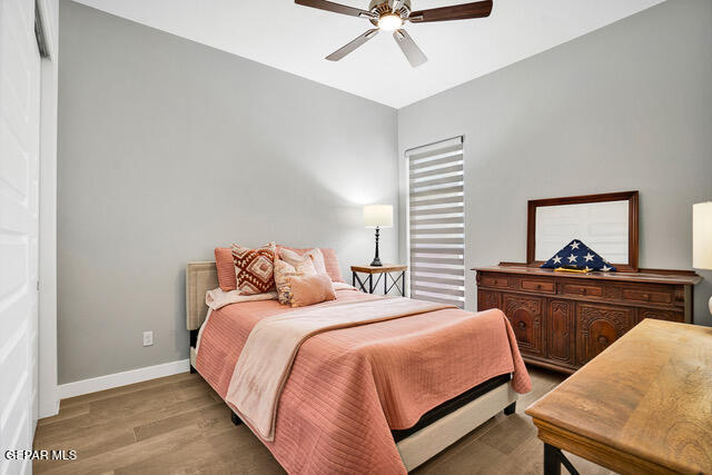 bedroom featuring ceiling fan and light wood-type flooring