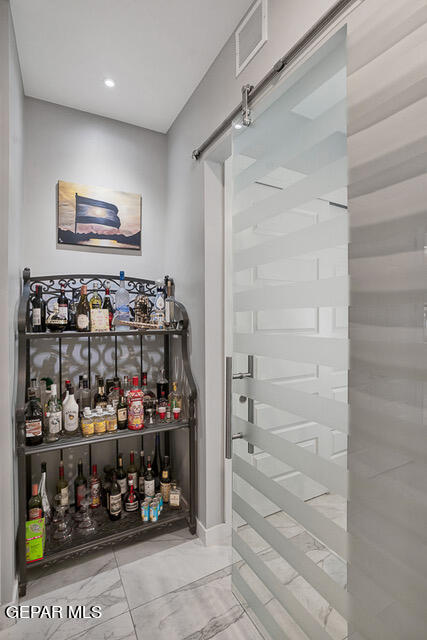 wine cellar featuring tile patterned flooring