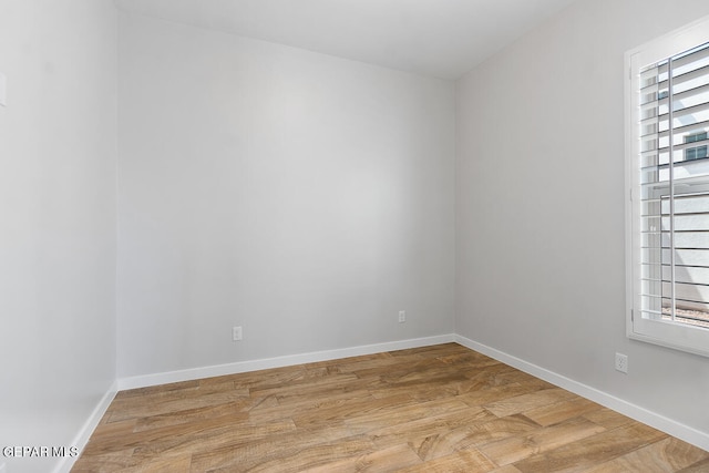 empty room with light wood-type flooring