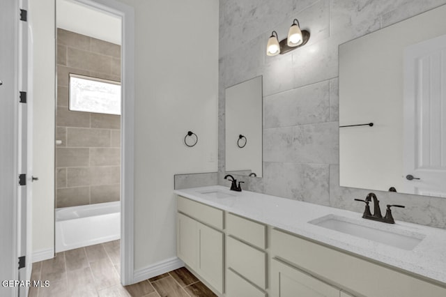 bathroom featuring vanity and hardwood / wood-style floors