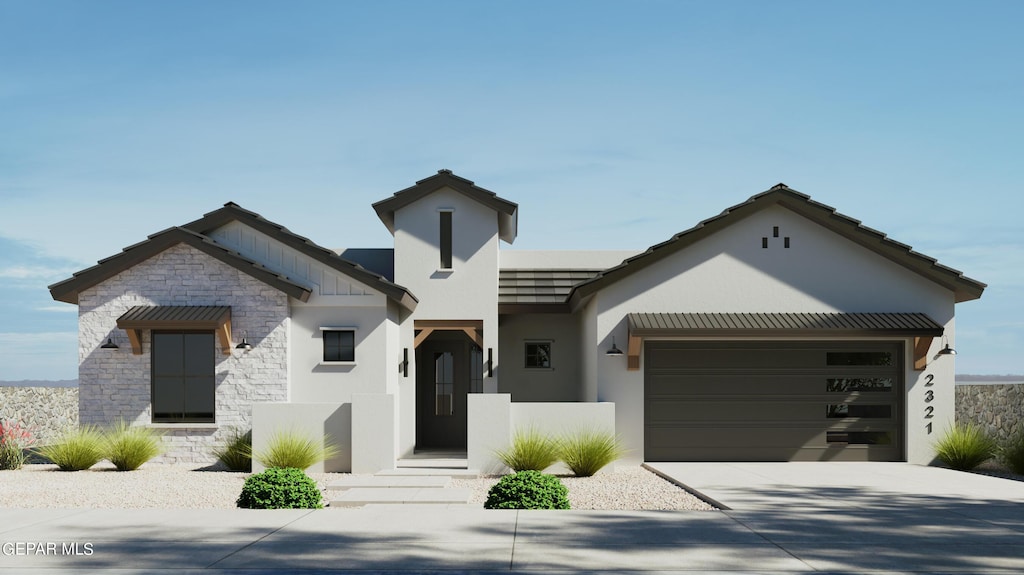 7351 Cimarron Rim Dr, El Paso, TX 79911 - view of front facade featuring a garage, concrete driveway, stucco siding, and stone siding