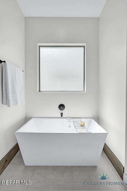 bathroom featuring tile patterned flooring