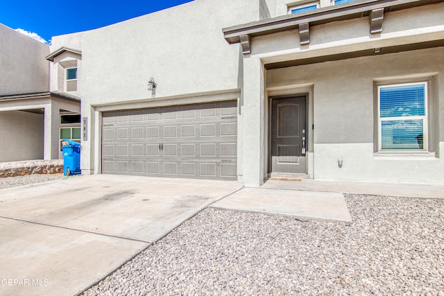 property entrance featuring a garage