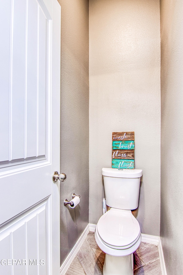 bathroom featuring toilet