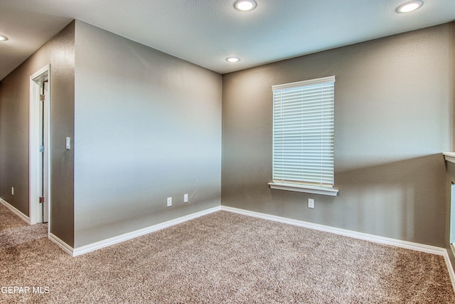 view of carpeted spare room