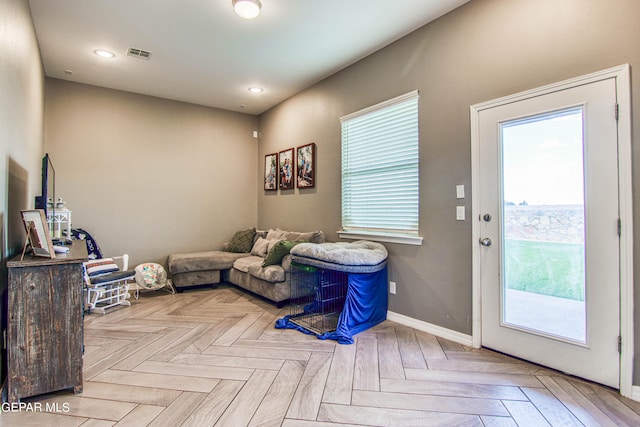 living room featuring light parquet floors