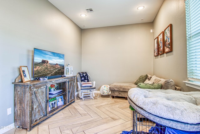 living room featuring light parquet flooring