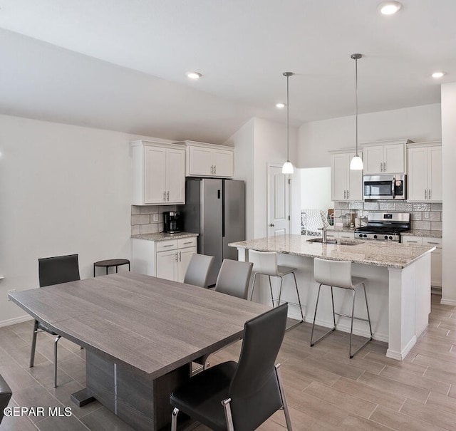 dining area with sink