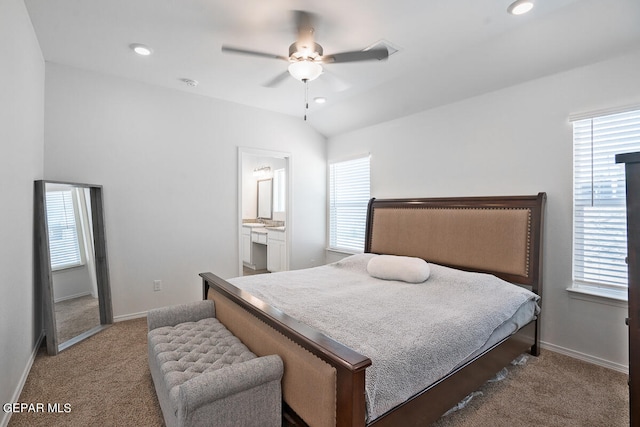 carpeted bedroom with ceiling fan and multiple windows