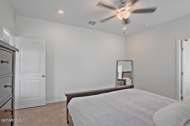 bedroom featuring ceiling fan and light colored carpet