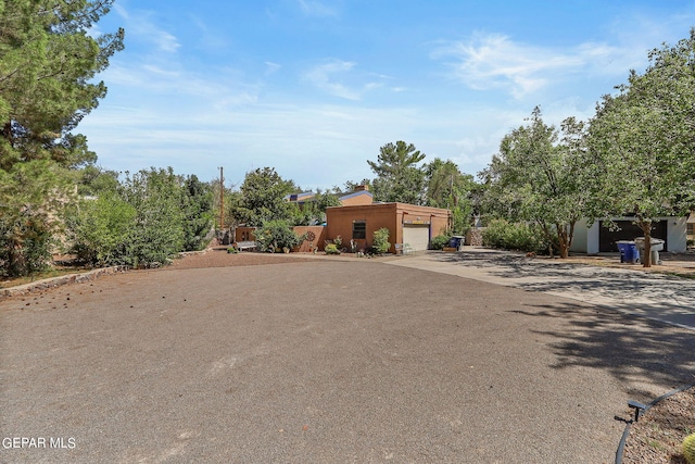 view of front of home featuring an outbuilding and a garage