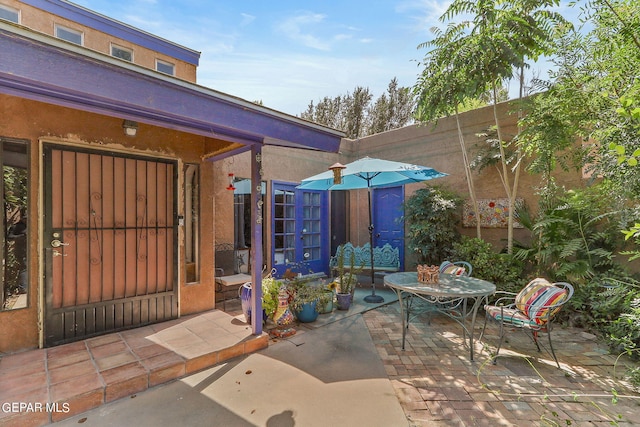 view of patio with outdoor dining area