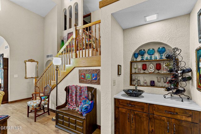 interior space with hardwood / wood-style floors and sink