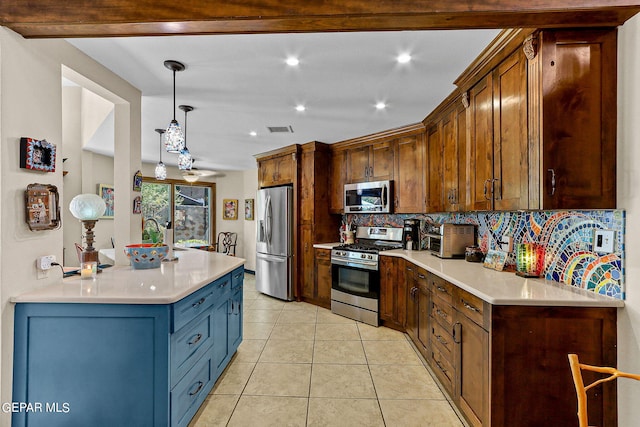 kitchen featuring light tile patterned floors, visible vents, light countertops, appliances with stainless steel finishes, and decorative backsplash