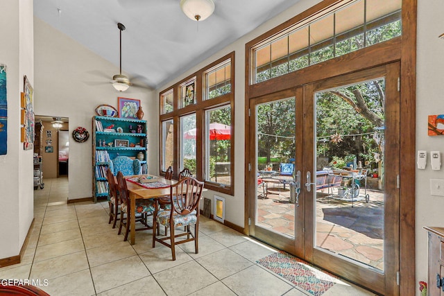 dining room featuring light tile patterned floors, french doors, a ceiling fan, and baseboards