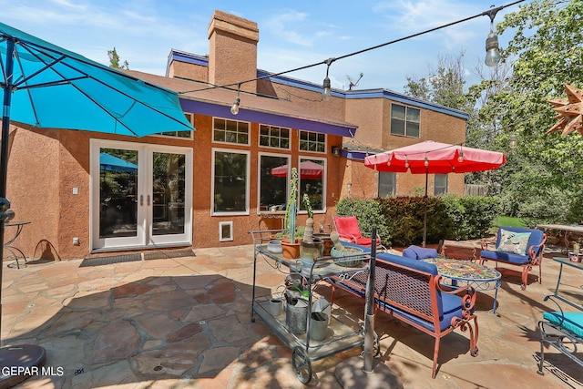 view of patio / terrace featuring french doors