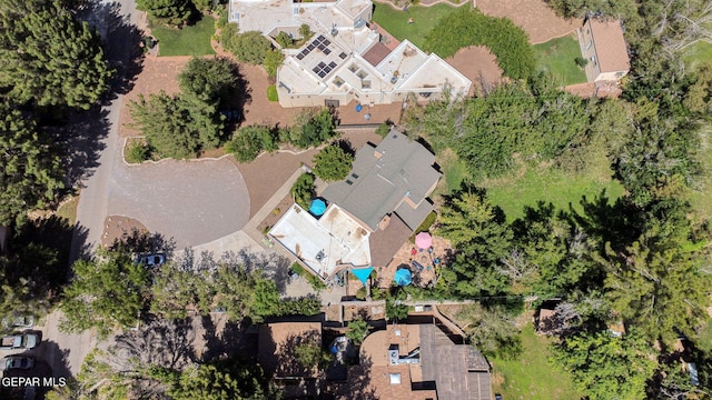 birds eye view of property with a residential view