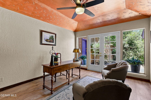 630 Gary Ln, El Paso, TX 79922 - office with a textured wall, french doors, light wood-style floors, vaulted ceiling, and ceiling fan