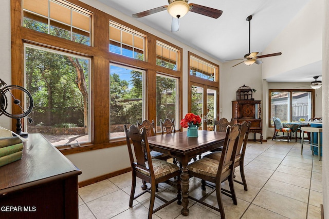 630 Gary Ln, El Paso, TX 79922 - dining area featuring ceiling fan, healthy amount of natural light, light tile patterned floors, and high vaulted ceiling