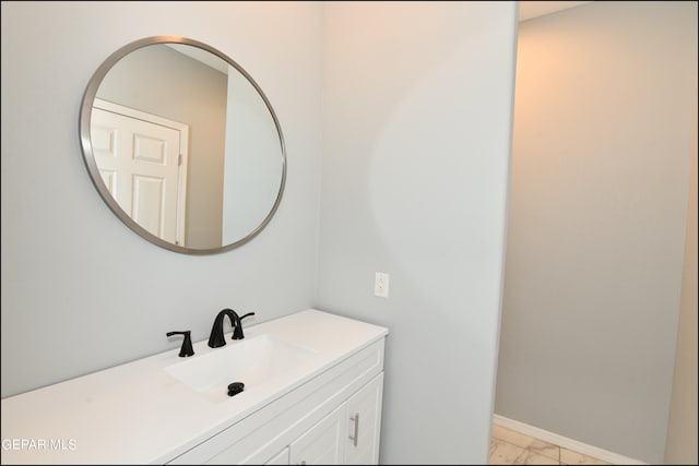 bathroom featuring tile patterned floors and vanity