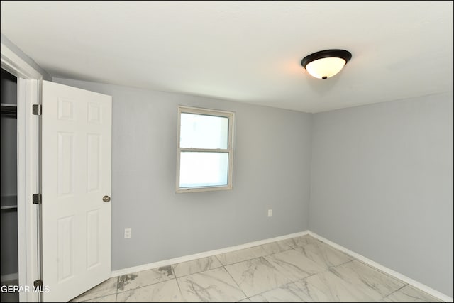 view of tiled spare room