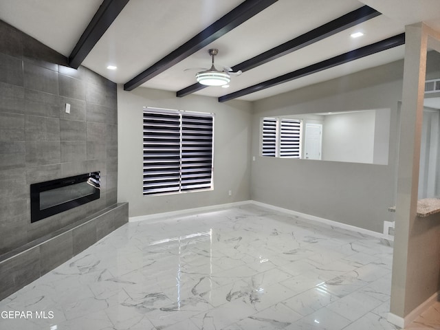 unfurnished living room featuring light tile patterned floors, vaulted ceiling with beams, a tiled fireplace, and ceiling fan