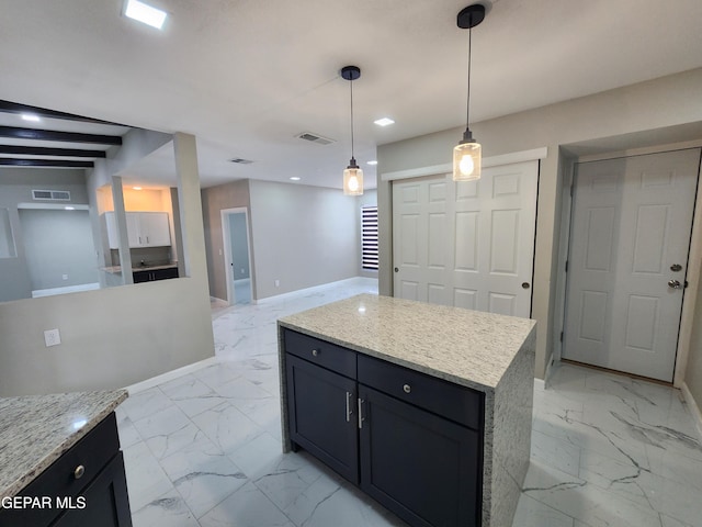 kitchen with light tile patterned flooring, beam ceiling, light stone countertops, a kitchen island, and hanging light fixtures