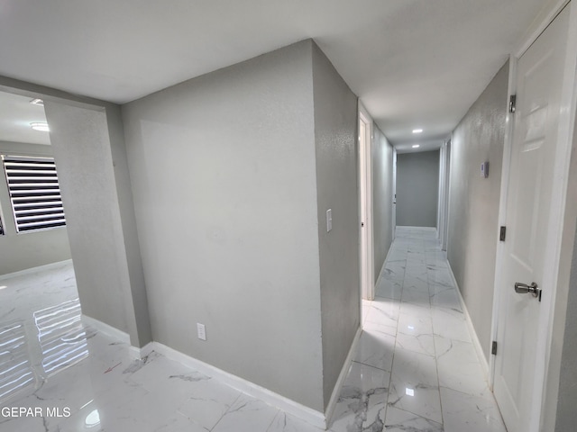 corridor featuring tile patterned flooring