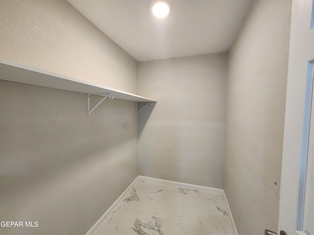 laundry room with tile patterned flooring