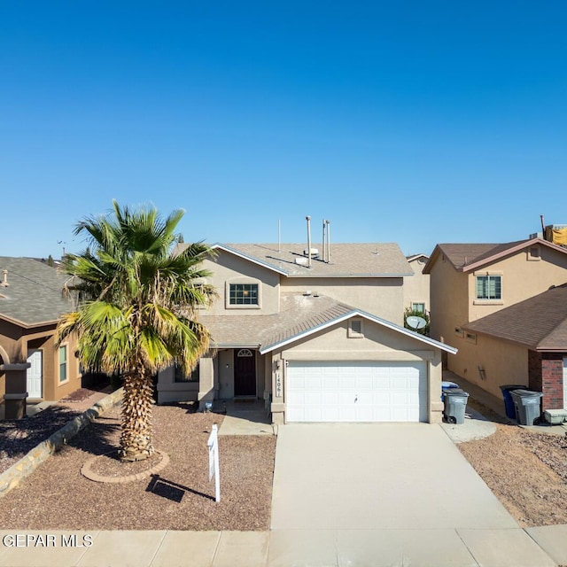 view of front of home with a garage