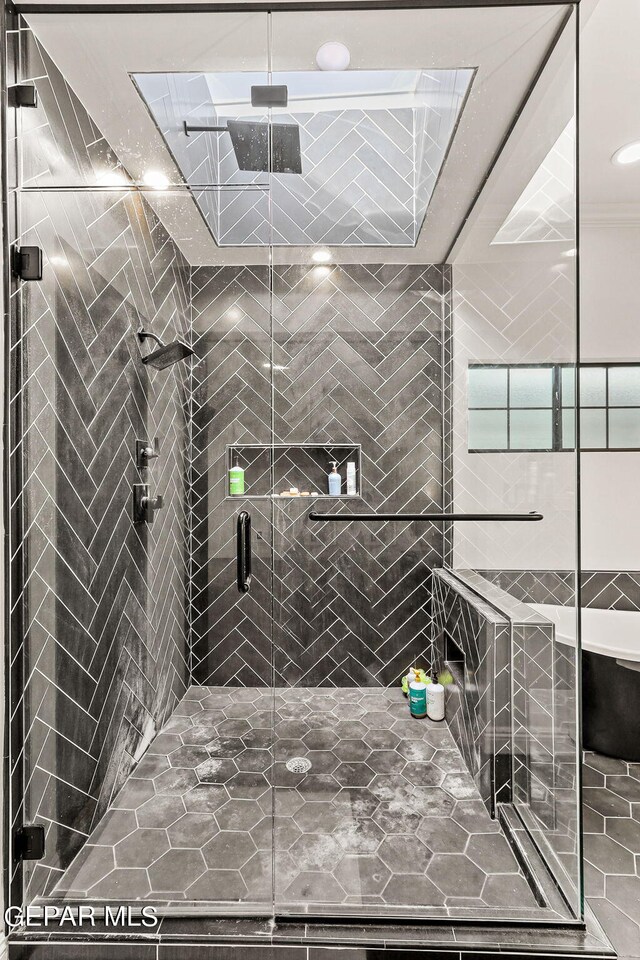 bathroom featuring an enclosed shower